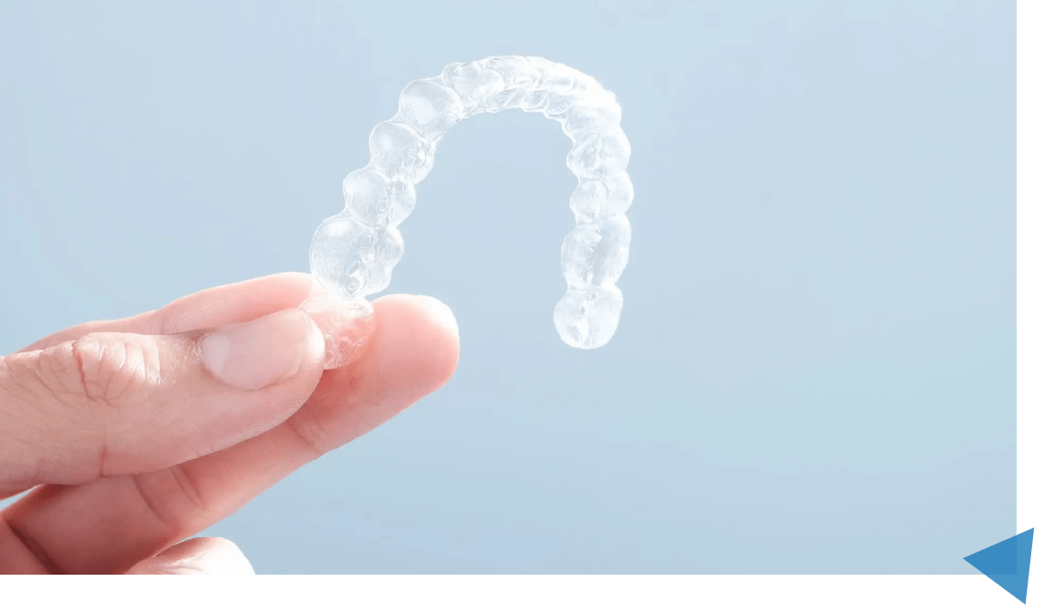 Person Holding An Invisalign